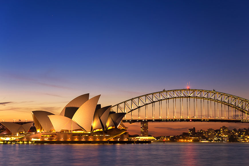 Sydney Opera House and Harbour Bridge at sunset